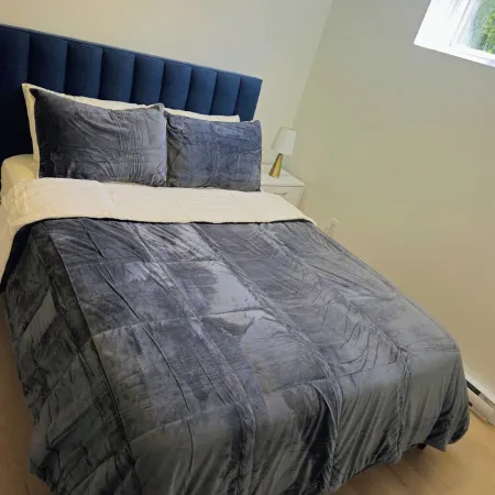 Fully furnished 1-bed basement apt in Moncton, fits 3 adults. Modern & cozy