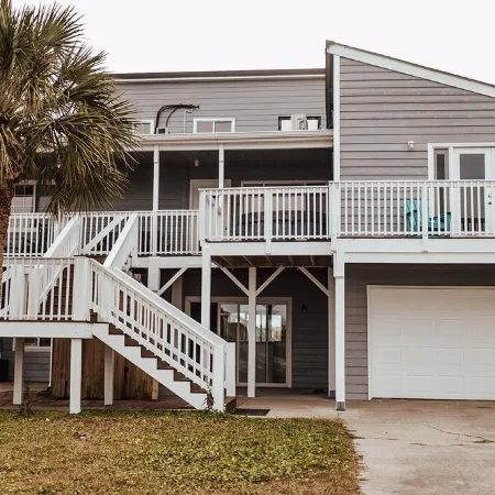 Spacious 5-bedroom house with private boat house/dock. Hot tub with serene views