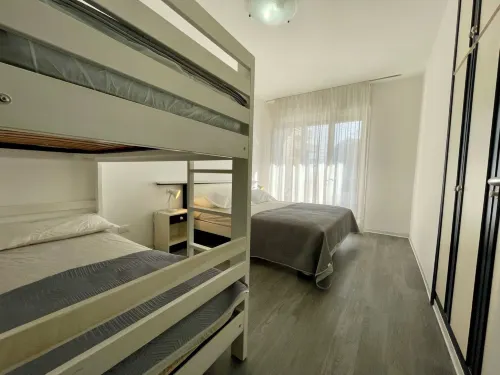 Appartamento con piscina condivisa