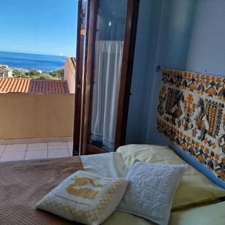 An Oasis of Relaxation, in a Dreamy Sea. Beautiful View of the Sea Mountain and Village