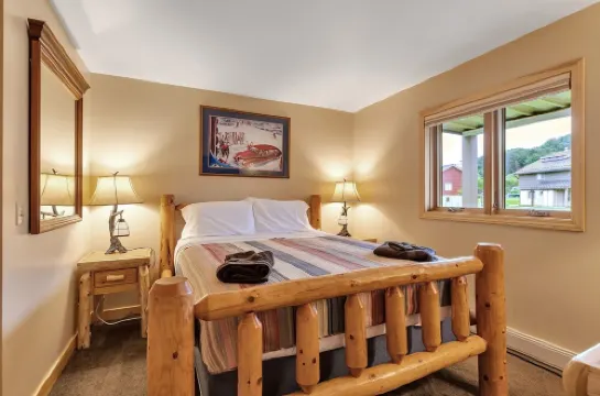 Updated townouse across from Holiday Valley - walk to ski lifts, pool and golf .