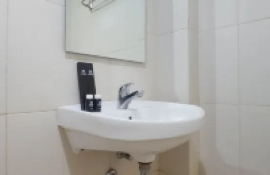 Compact and Cozy Studio Apartment at Orchard Supermall Mansion By Travelio