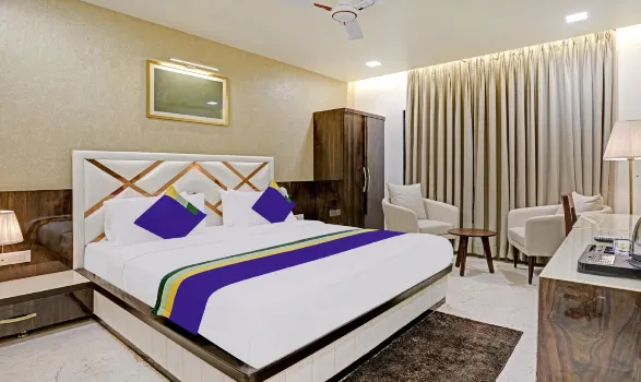 Treebo Premium Golden Bliss Trimurti Nagar Square Hotels near Vibration Sportz Cafe