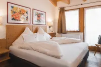 Alpina&More Apartments I Zimmer