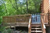 Cozy Pet Friendly Mountain Log Cabin in the Smokies with Deck and fire pit.