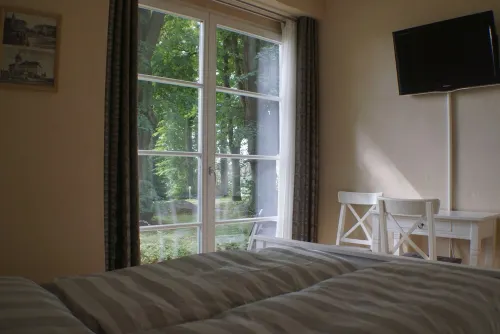 Holiday in the castle park Hohen Niendorf with terrace & view to the Baltic Sea