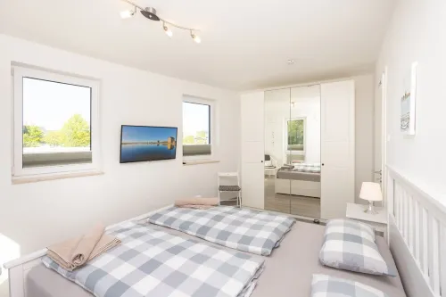 Modern apartment with stunning views of the water and the Rügen Bridge