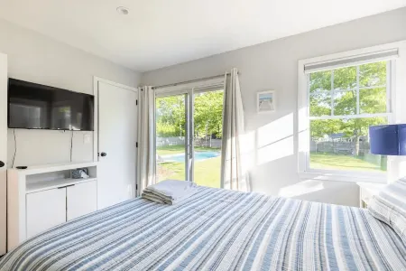 Chic Hamptons Home with Heated Gated Pool and Grill