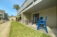 Charming 1Br Condo on the beach with pool outside back door and beach access.