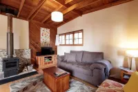 The Cabin-Wake up to the sound of native birdlife.