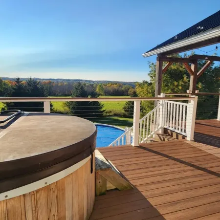 Private Finger Lakes Getaway with a Pool, Hot Tub, and Sauna, Timber Frame Porch