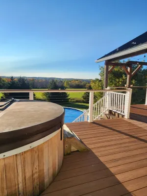 Private Finger Lakes Getaway with a Pool, Hot Tub, and Sauna, Timber Frame Porch