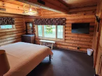 cozy lake house, full log cabin on beautiful shell lake, w/ wonderful loft.