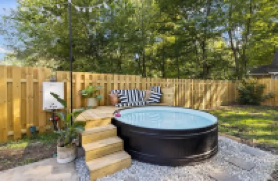 White Guesthouse with a Pool