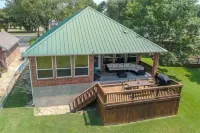 Bright, open concept, lakefront house on open water with amazing sunset views!