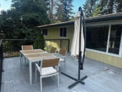 Unit surrounded by treesWasher and Dryer + Pet friendly!