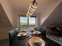 BlackNCozy - Design apartment with box-spring bed and balcony Hotels in Lorrach