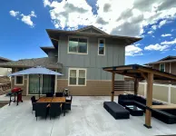 NEW HOME in Private Community with Ocean/Mountain Views.  5 Min. Drive to Beach
