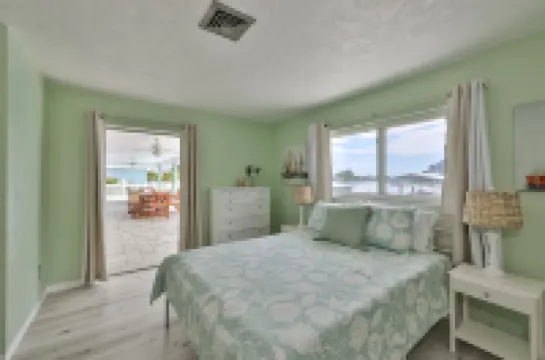 Spacious waterfront home in Apollo Beach w/ private swimming pool and boat dock.