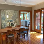 Bright art-filled home, fruit trees, valley view