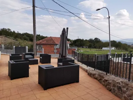 Carrioza Alojamiento Turístico Отели в г. Cerreda