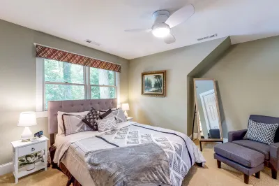 Waterfront allergy-free home with 40-foot fishing dock, canoe, home theater