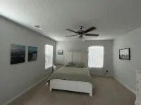 5 bedroom spacious home, with charcoal grill and seating. Peaceful neighborhood.