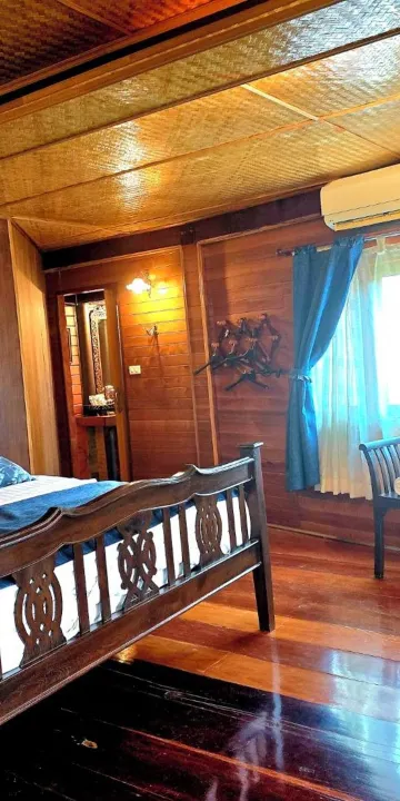 ห้องพักสำหรับสามท่านพร้อมวิวสวน