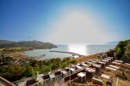 Yakamoz Otel Отели в г. Гёкчеада