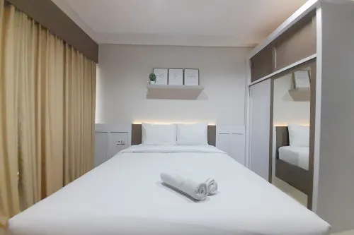 Cozy Studio Room at Patraland Amarta Apartment - Business