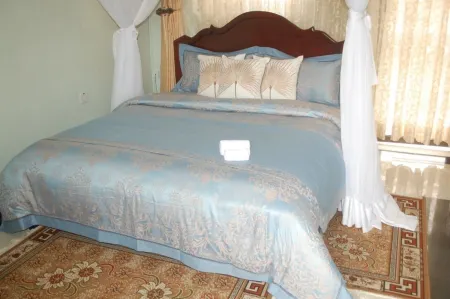 TJ Global Hotel Kasese Отели в г. Касесе