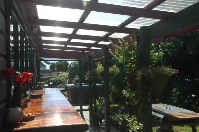 Moanarua Beach Cottage Hotels near Wharekura Reserve
