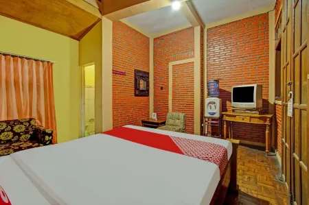 Hotel O Villa Papada Отели рядом с достопримечательностью «Coban Rondo Waterfall»