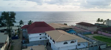 Atlantis Beach Hotel Отели в г. Грэйтер Монровия