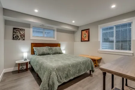 Spacious Living with Gourmet Kitchen and Smart TVs - Modern Retreat