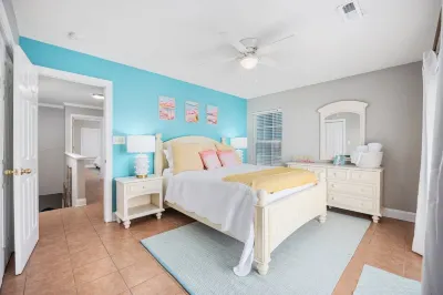 Spacious 3rd Row Beach House with a Heated Saltwater Pool & Hot Tub