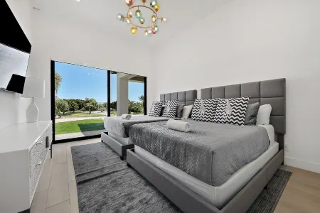 Over 2.5 acres of privacy >6000 sq ft of fun