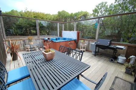 4.5 Bedrooms, 3 Baths, 2 Kitchens, 180 degree views and a 'Man Cave'