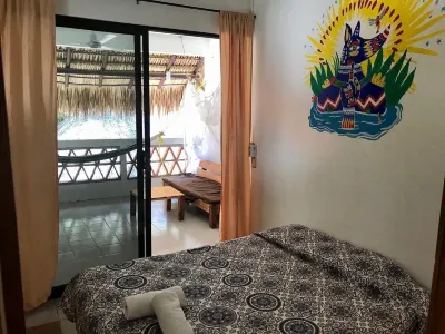 Nomad Beach House - Hostel Отели в г. 