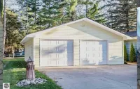 Spectacular Lake Front Home on Beautiful Higgins Lake with Amazing Sunset Views