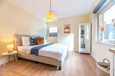 Modern vacation apartment with roof terrace in the second row to the beach on Sandwall Отели в г. Вик-ауф-Фёр