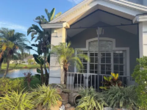 Relax in my calm and stylish space. Enjoy the relaxing lakeview and heated pool.