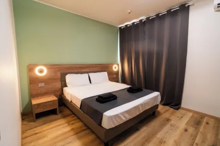 Elysium Self Check-In Rooms Отели в г. Треццо-суль-Адда