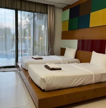 ห้องดีลักซ์เตียงแฝดพร้อมทางเข้าสระว่ายน้ำ