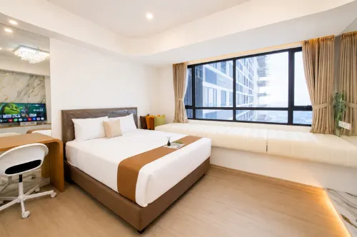 Ivory Studio at Collins Boulevard Apartment By Travelio