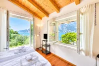 Villa Il Paradiso di Gabri: Lake-View Villa with Garden - Happy Rentals - 4 tähden
