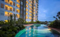 Grey Toned 1BR Apartment Tamansari Skylounge Makassar By Travelio - Daireler