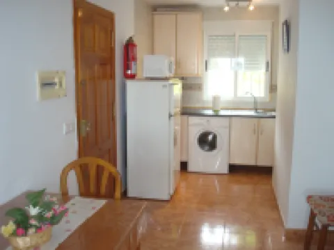 Apto en planta baja, con amplia terraza, dos dormitorios y aire acondicionado Hoteles en Vera