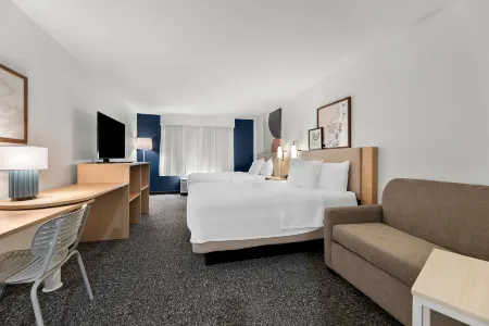 Spark by Hilton Tupelo