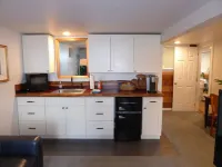 PORTHOLE:  Peaceful with a private, locked, covered patio to relax/ store bikes.